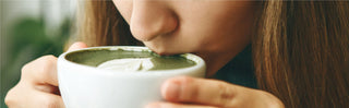 woman drinking matcha tea